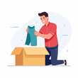 © hani - Man Unpacking Clothes from Cardboard Box