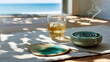 © seogi - A hand fan, mosquito repellent, and a cup of cold beverage filled with ice on a sunlit indoor hemp cloth. Concept of Oriental Summer Atmosphere.
