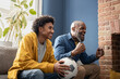 © ReeldealHD images - Father and son celebrate a soccer goal together