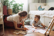 © dsheremeta - Mother and child learning together at home