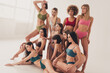 © deagreez - Diverse group of women models posing in colorful underwear in a bright studio celebrating body positivity and fashion