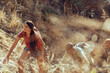 © Marko Geber - Group of hikers climbing a dry hillside trail