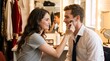 © Vasiliy - Female makeup artist applying cosmetics to a smiling male actor with a brush. Young man and woman in a brightly lit backstage dressing room. Behind the scenes theater and film production concept