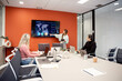 © ADDICTIVE STOCK - Coworking team meeting with data presentation in office