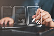 © Nirusmee - Businessman reviewing and signing digital contracts on laptop, representing document approval, agreement verification, project review, and business workflow management.