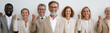 © pattozher - United Business Team: A diverse group of business professionals stand together, celebrating success, expressing teamwork, unity and achievement. The atmosphere exudes confidence, camaraderie.