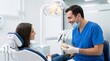 © Eka - Smiling male dentist offers professional guidance and patient education to a woman during a dental consultation, fostering trust in a modern clinic