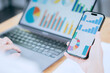 © SROI - Business Analytics Dashboard on Smartphone and Laptop Screen