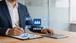 © Li - Businessman analyzing data on clipboard with digital hologram graph interface corporate strategy concept modern office workspace technology