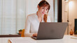 © Andrii Nekrasov - Woman Working From Home On Laptop At Desk