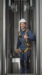 © NN AI - Smiling elevator technician in hard hat giving thumbs up. Vertical portrait of professional worker in safety harness during lift installation or maintenance.