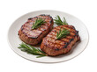 © Saoirse - Isolated perfectly grilled beef steaks with fresh rosemary on a ceramic serving plate.