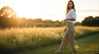 © SashaMagic - Woman in natural light wearing eco-friendly trousers in a golden hour field, embodying minimalist sustainable fashion.