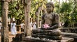 © Влада Яковенко - Stone statue with an offering lotus flower in Sri Lanka, spiritual heritage detail, peaceful temple culture and devotional symbolism, travel concept with strong commercial relevance, soft natural