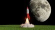 © Deamard - A toy rocket takes off from green grass against the backdrop of a huge moon, a concept of dreams and aspirations for space.