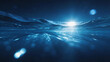 © 沈军 贡 - A serene underwater view showing sunlight beams filtering through calm deep blue ocean waves, with soft bokeh effects and sparkling light refracting through the water.