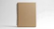 © MindRender - Single closed spiral bound notebook with a plain tan cover isolated on white background