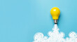 © Sarah - Rocketing yellow lightbulb on blue background perfect for creative business innovation and success
