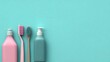© Sawat - Stylish bathroom essentials with toothbrush, toothpaste, and body wash arranged on a vibrant teal background