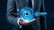 © Umer - business professional holding verified digital identity hologram with futuristic biometric security interface