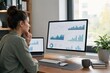 © Studio - Focused professional woman analyzing data on dual monitors in bright modern home office with natural light, contemplative expression, remote work and business analytics concept