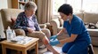 © Thipsuda - Nurse in blue uniform providing home care first aid to elderly woman with leg wound, using medical supplies, in cozy living room, caring and attentive atmosphere