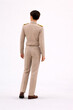 © Tenity - Rear View of Young Male Civil Servant in Beige Uniform Standing on White Background