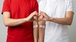 © MD IQBAL my daddy - World blood donor day celebrating life saving donations with two donors showing arms after donation
