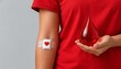 © MD IQBAL my daddy - World blood donor day celebrating lifesaving donations with a symbolic blood drop and bandage