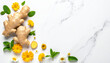 © Athiphat - Fresh ginger root, chamomile flower, calendula flower, mint leaf, and daisy arranged on white marble background create minimalist natural remedy composition with refreshing mood