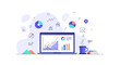 © Ayeshas - Business analytics on a laptop screen with office supplies and charts