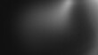 © Malik Hammad  - Abstract dark grey gradient background featuring soft spotlight illumination and subtle grain texture for modern minimalist graphic design projects requiring a professional dark atmospheric backdrop