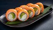 © James - fresh sushi on a black plate there are rolls filled with fish cucumber and avocado topped with salmon