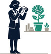 © Elizabeth - Professional businesswoman holding glasses looking at a brain growing in a plant pot representing mental growth and development