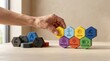 © KohXD - A person's hand placing a wooden block with the word 'stop' signifying energy mix reconfiguration concept