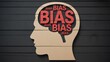 © Art by Toha - Conceptual illustration of cognitive bias with text inside a human head profile