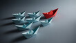 © Raiyan Arts - Red paper boat leading small fleet of white origami vessels representing leadership and innovative thinking.