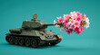 © SharpShot Studio - Military tank with pink flowers bouquet coming out of barrel on turquoise background symbolizing peace and contrast