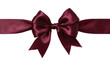 © Freya - Deep red satin ribbon bow tied around a gift, isolated on transparent background