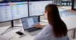 © Andrey Popov - HR Manager Checks Payroll Data On Multiple Screens