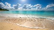© JUWEL - happy mother's day message written in beach sand with tropical ocean and sky background