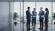 © Nang - Futuristic AI Collaboration Team Using Holographic Data Interface in Modern Office