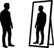 © creative - Man looking at his own reflection in a full-length mirror silhouette
