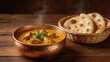 © 蒙 王 - Steaming curry with naan bread