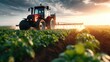 © svastix - A powerful red tractor sprays pesticides across lush green crops under a dramatic sky, showcasing modern agricultural practices and the importance of farm maintenance.