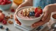 © Pinklife - A beautifully arranged smoothie bowl, filled with vibrant berries and toppings, represents healthy living and a delicious start to the day in this inspiring culinary creation.