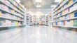 © horizon - Softly defocused view of a bright pharmacy aisle shows fully stocked shelves of colorful products reflecting on the polished white floor.