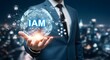 © Nimra - Businessman holding AI and IAM digital icons for identity access management and enterprise security