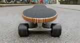 Electric skateboard, modern design, wooden deck, black wheels