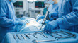 © Taras Roshchuk - Surgical team works on a patient in a hospital operating room. Medical staff wears masks and gloves. Instruments lie on the table as they focus on the procedure